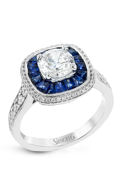 a white gold halo engagement ring with diamonds and deep blue sapphires