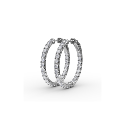 Diamond-studded white gold hoop earrings