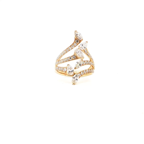 Twisted gold cocktail ring adorned with marquise-cut diamonds and delicate diamond accents.