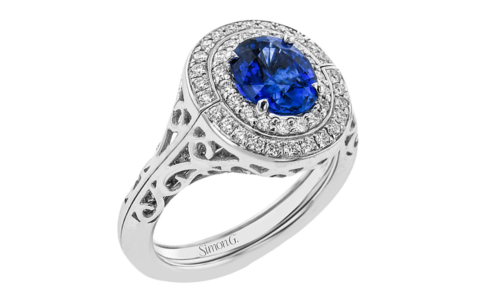 An elegant Simon G sapphire ring with ornamental metal work, available at Drenon Jewelry.