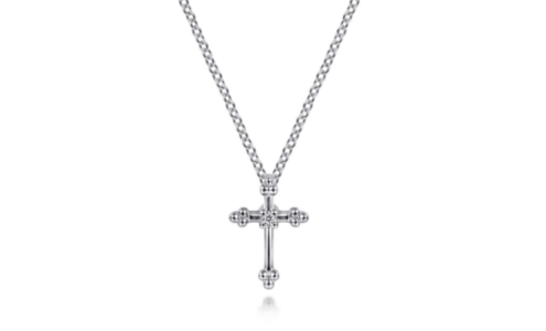 A delicate Gabriel & Co. necklace with a cross pendant, available at Drenon Jewelry.
