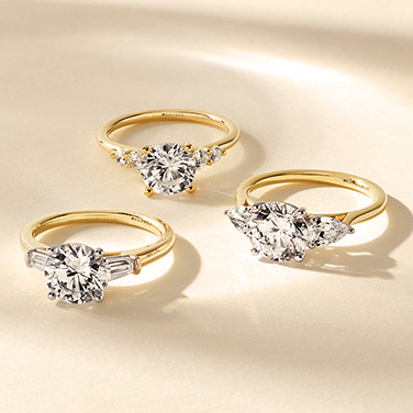 Three Yellow Gold Engagement Rings